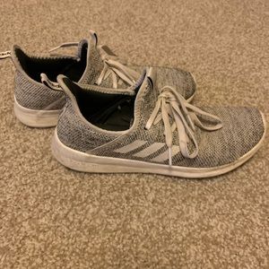 Black,white and grey adidas tennis shoes